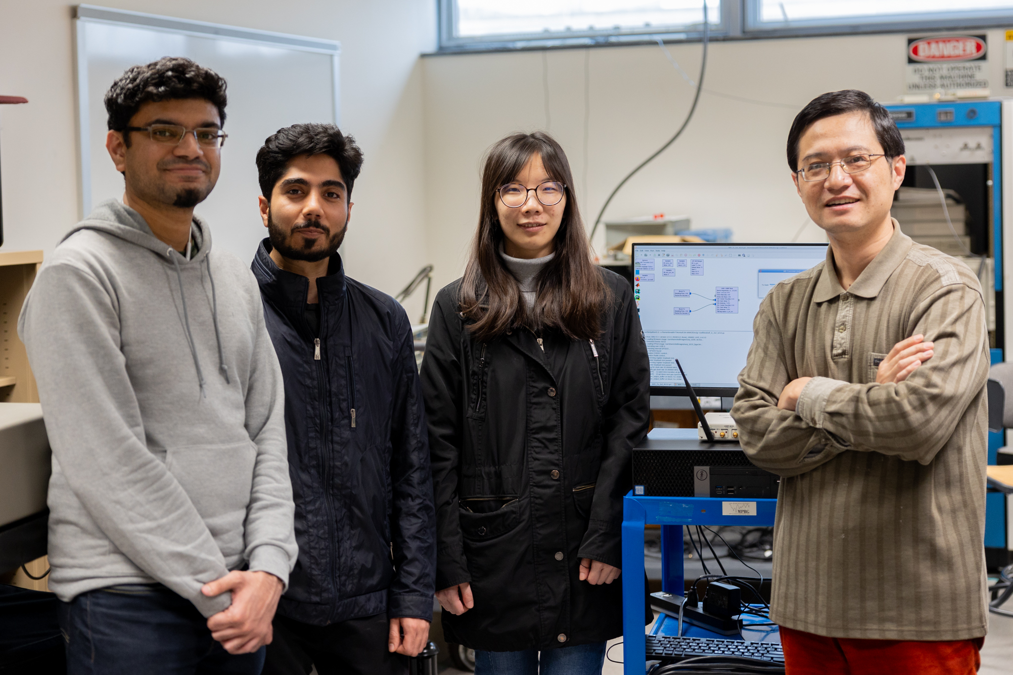 Lingjia Liu and several of his graduate students. Photo by Ben Murphy for Virginia Tech.